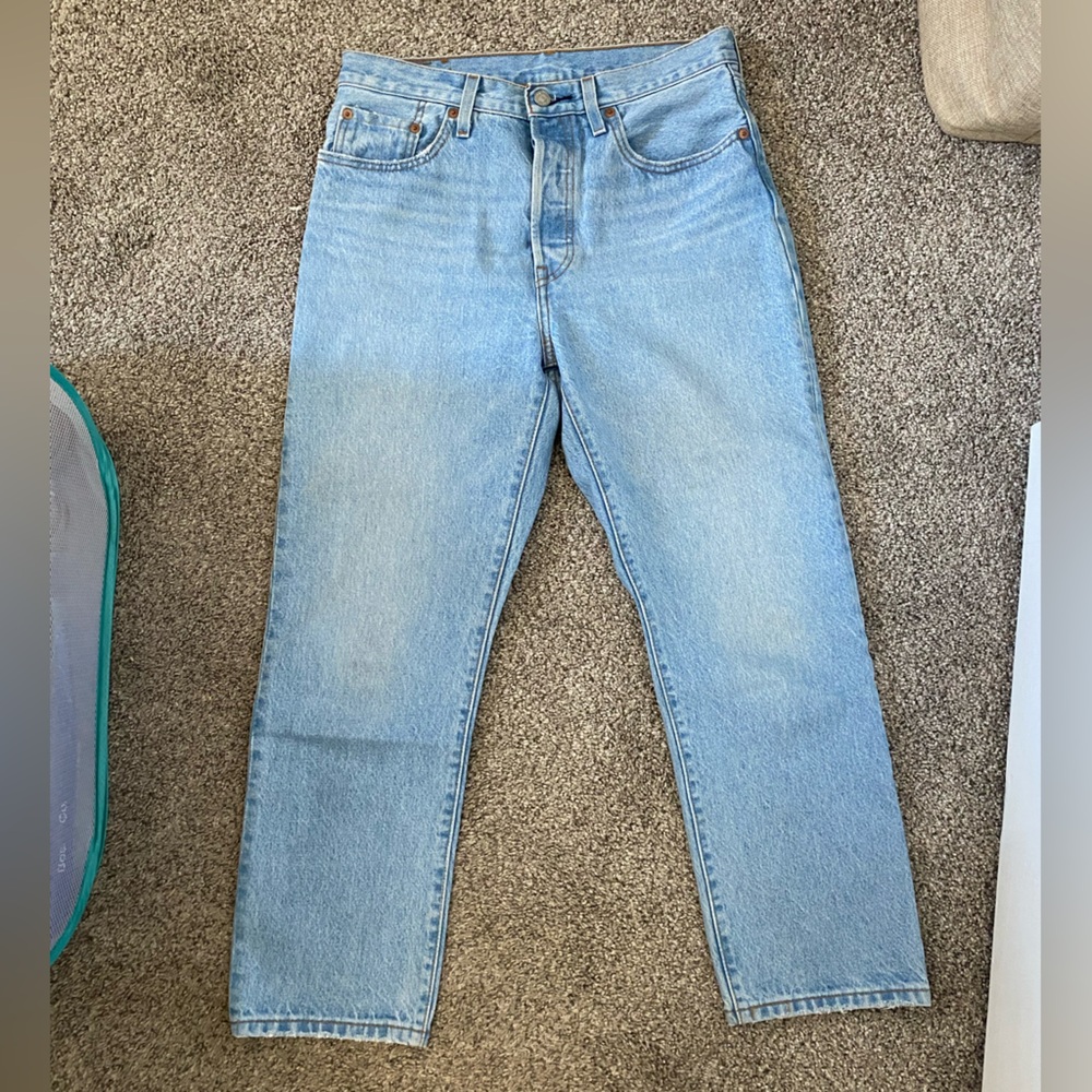 rigid light blue levi's 501 jeans with button fly